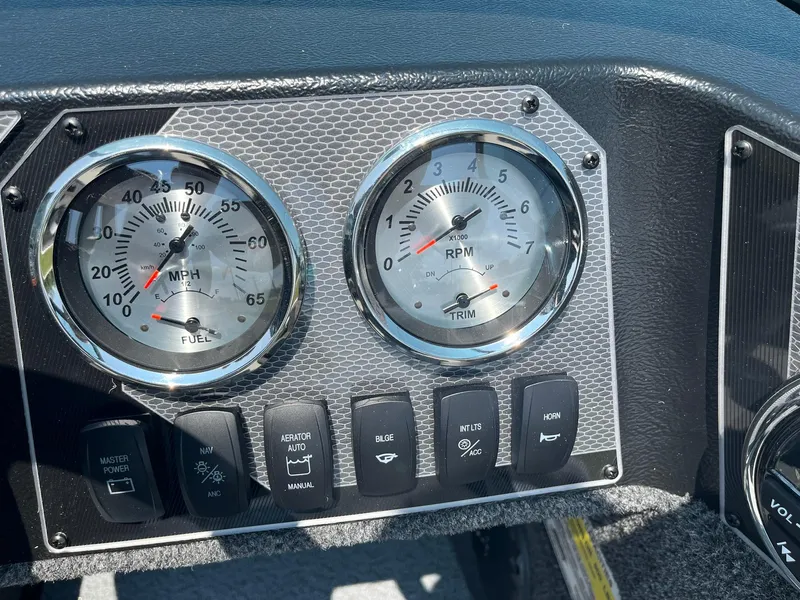 Slide: The Image of Dashboard of 2025 Lund 1675 Adventure Sport boat with speedometer and RPM gauges. - 18