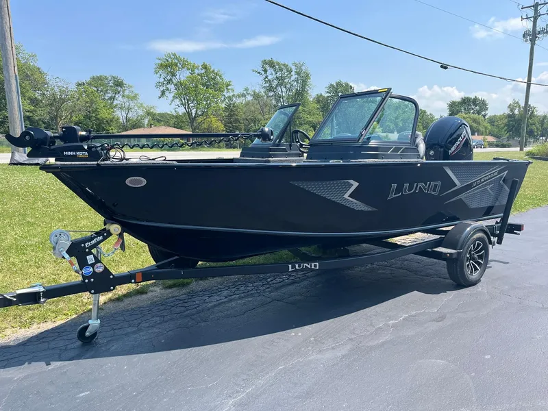 Slide: The Image of 2025 Lund 1675 Adventure Sport fishing boat on a trailer. - 4