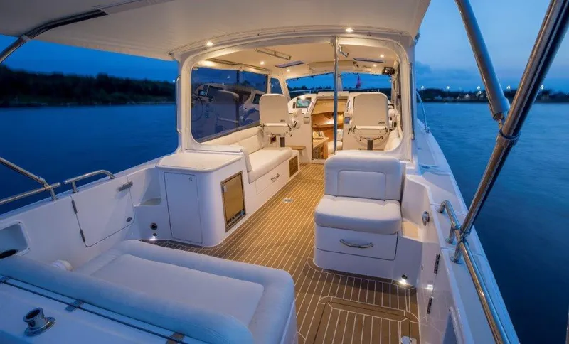 Slide: The Image of Luxurious interior of the 2025 MJM 35 yacht at dusk. - 14
