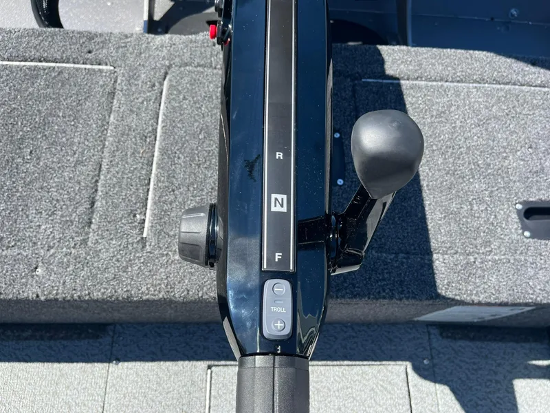 Slide: The Image of 2025 Lund 1875 Pro Guide boat control panel with forward, neutral, and reverse settings. - 19