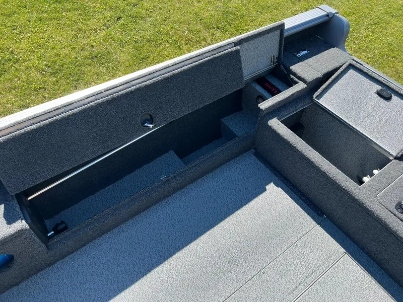 Slide: The Image of 2025 Lund 1875 Pro Guide boat interior storage compartments. - 21