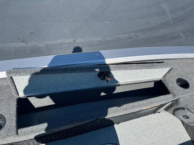 Slide: The Image of 2025 Lund 1875 Pro Guide boat interior storage compartment. - 22