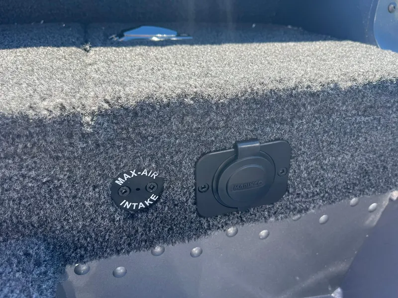 Slide: The Image of 2025 Lund 1875 Pro Guide boat with Max-Air intake and power outlet. - 23