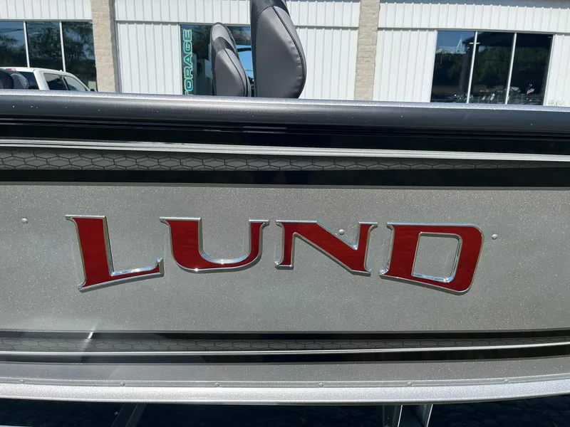 Slide: The Image of 2025 Lund 1875 Pro Guide boat with red logo. - 27