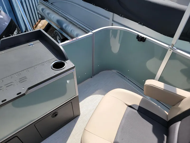 Slide: The Image of Interior of 2025 Harris Cruiser 230 pontoon boat with seating and storage. - 19