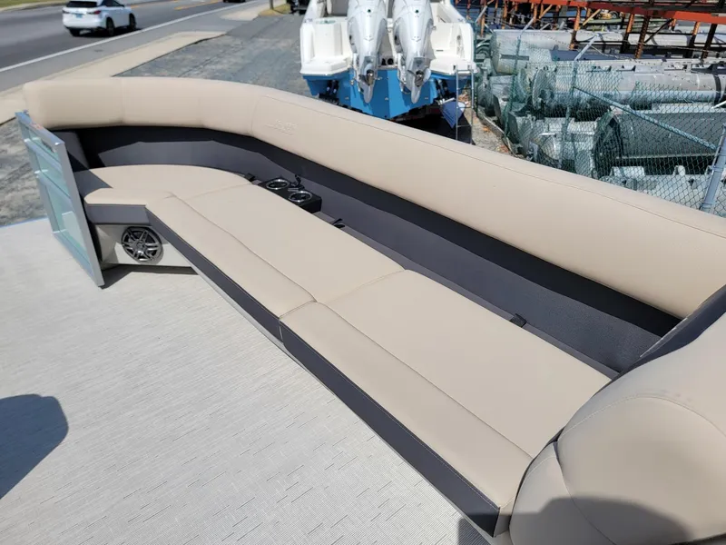 Slide: The Image of 2025 Harris Cruiser 230 boat with spacious seating and modern design. - 29