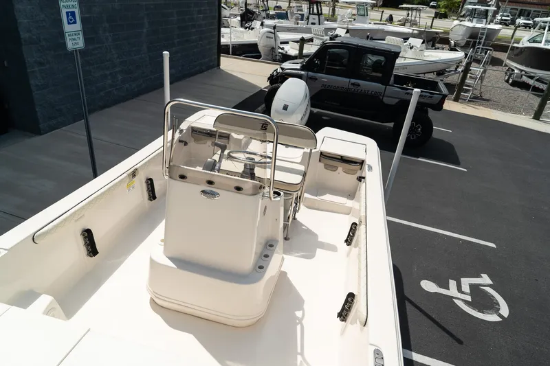 Slide: The Image of 2024 Carolina Skiff 17 LS boat in parking lot, rear view. - 14