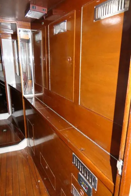 Slide: The Image of Interior of a 1970 Southern Ocean GALLANT 53 sailboat with wooden cabinetry and flooring. - 20
