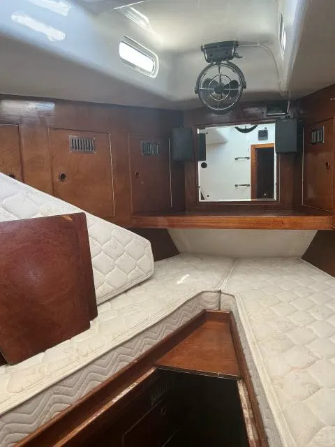 Slide: The Image of Interior cabin of a 1970 Southern Ocean GALLANT 53 sailboat with wooden finishes. - 24
