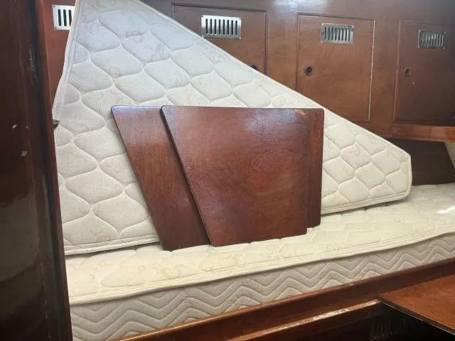 Slide: The Image of Interior of 1970 Southern Ocean GALLANT 53 sailboat with mattress and wooden panels. - 25