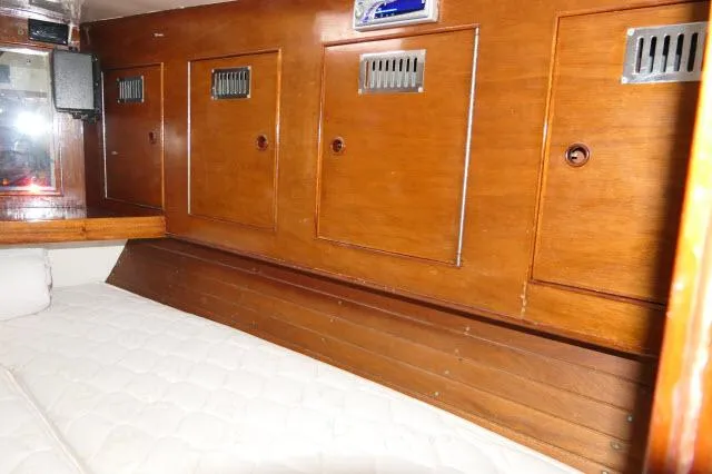 Slide: The Image of Interior cabin of 1970 Southern Ocean GALLANT 53 sailboat with wooden storage cabinets. - 27
