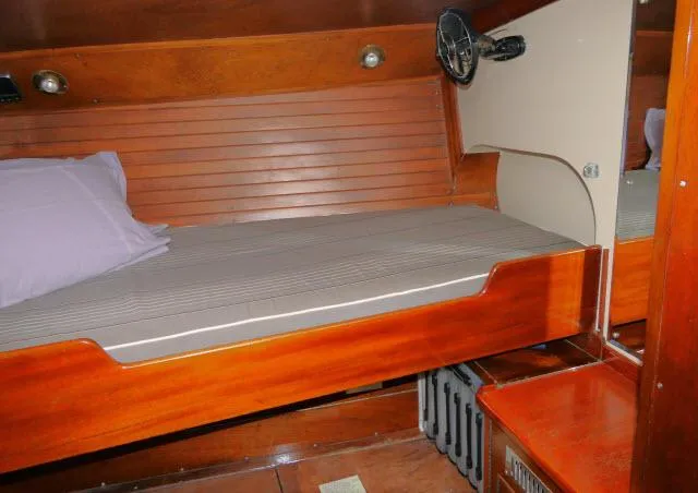 Slide: The Image of Cozy wooden cabin bed in a 1970 Southern Ocean GALLANT 53 sailboat. - 29