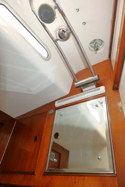 Slide: The Image of Interior of 1970 Southern Ocean GALLANT 53 yacht with wooden cabinetry and mirror. - 33