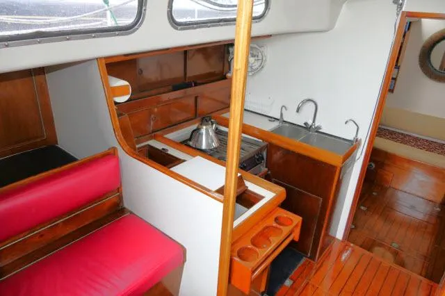 Slide: The Image of Interior of 1970 Southern Ocean GALLANT 53 sailboat with kitchen and seating area. - 4