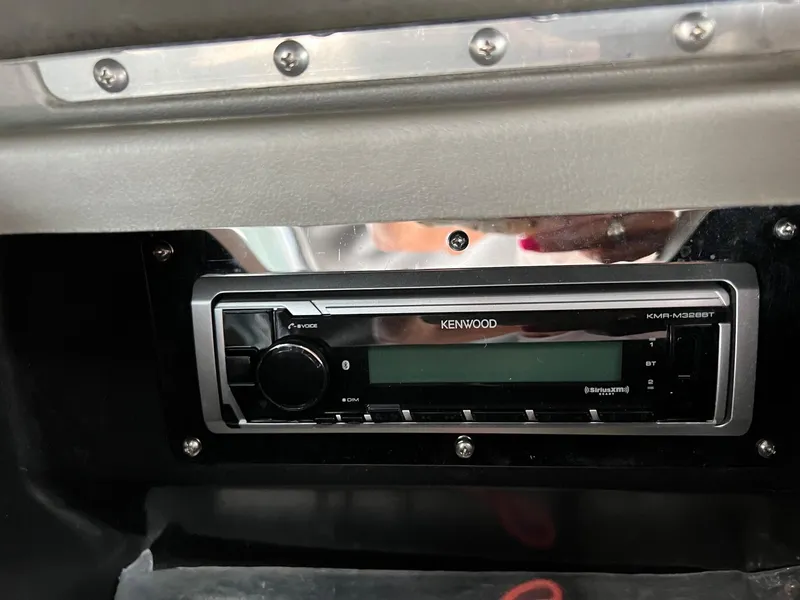 Slide: The Image of Kenwood stereo system in a 2006 Regal 2200 Bowrider boat. - 14