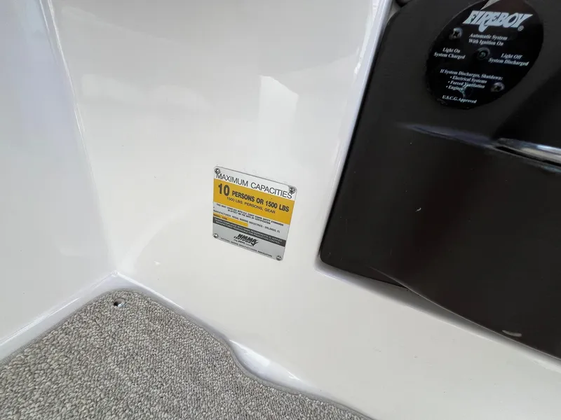 Slide: The Image of 2006 Regal 2200 Bowrider capacity label, maximum 10 persons or 1500 lbs. - 15