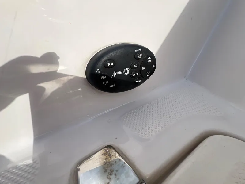 Slide: The Image of Audio control panel on a 2006 Regal 2200 Bowrider boat. - 24