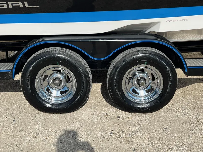 Slide: The Image of Close-up of 2006 Regal 2200 Bowrider trailer wheels and tires. - 32