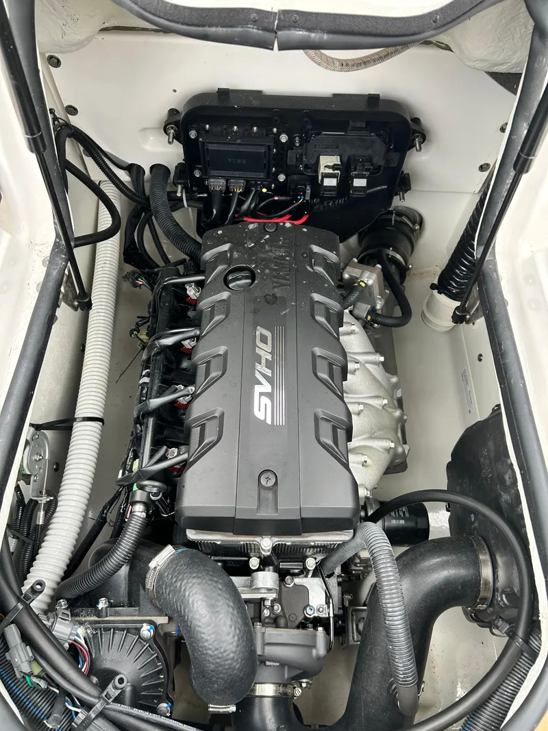 Slide: The Image of 2022 Yamaha Boats 195 S engine compartment with SVHO engine. - 19