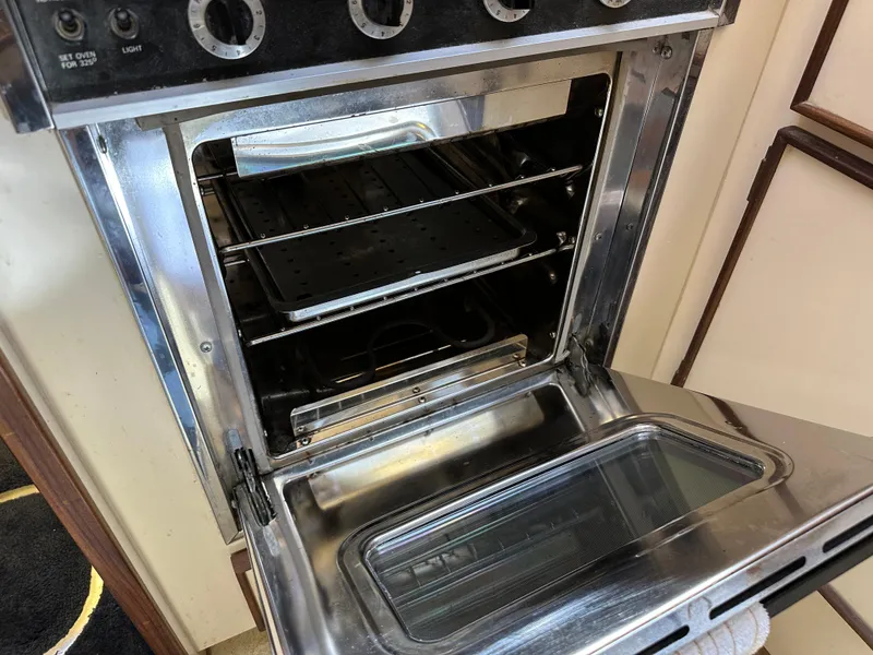 Slide: The Image of Open oven in 1985 Hatteras 36 Convertible yacht kitchen. - 19
