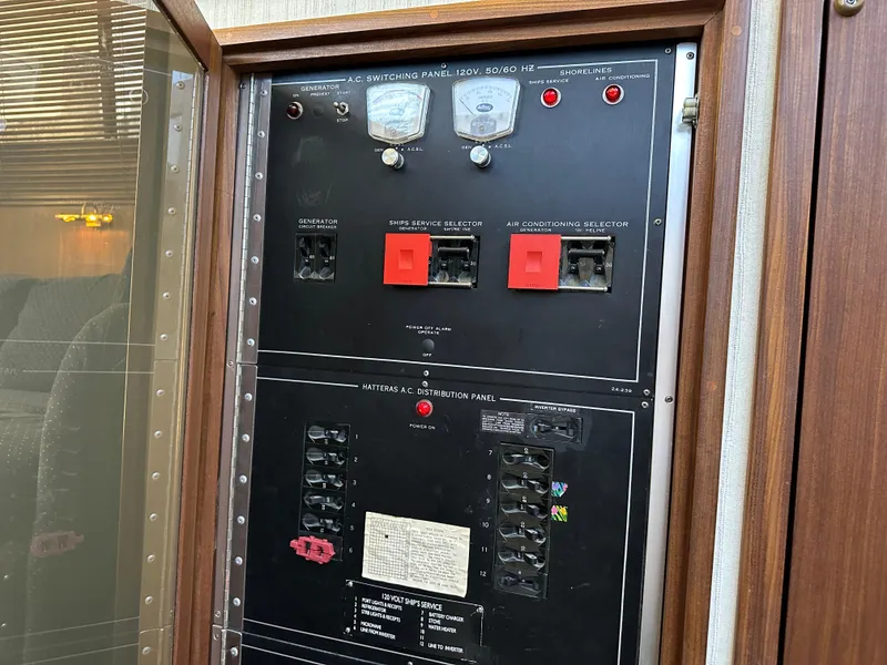 Slide: The Image of Electrical control panel on a 1985 Hatteras 36 Convertible boat. - 31
