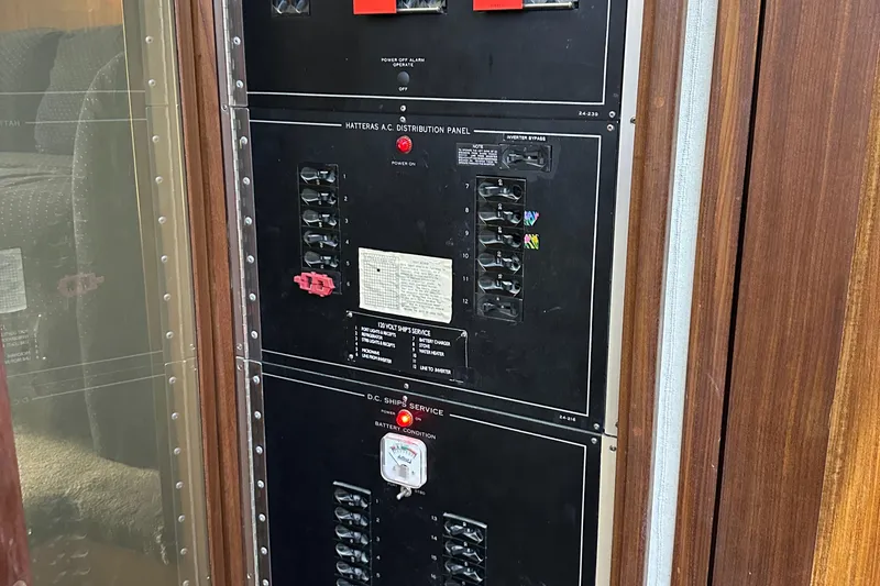 Slide: The Image of Electrical panel on a 1985 Hatteras 36 Convertible boat. - 33