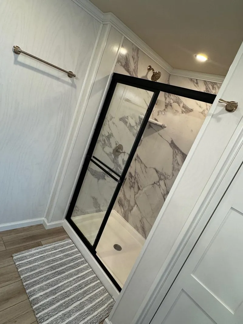 Slide: The Image of Modern bathroom shower in 2024 Sumerset Limitless Share 10 houseboat. - 16