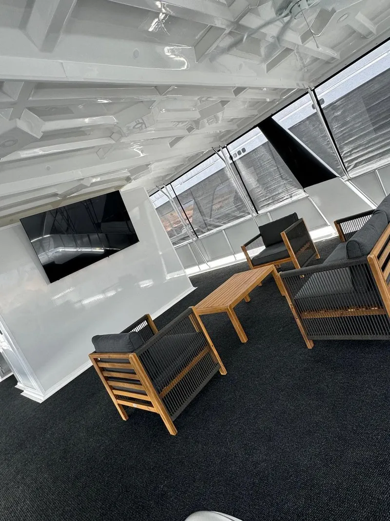 Slide: The Image of Modern lounge area on 2024 Sumerset Limitless Share 10 houseboat. - 20