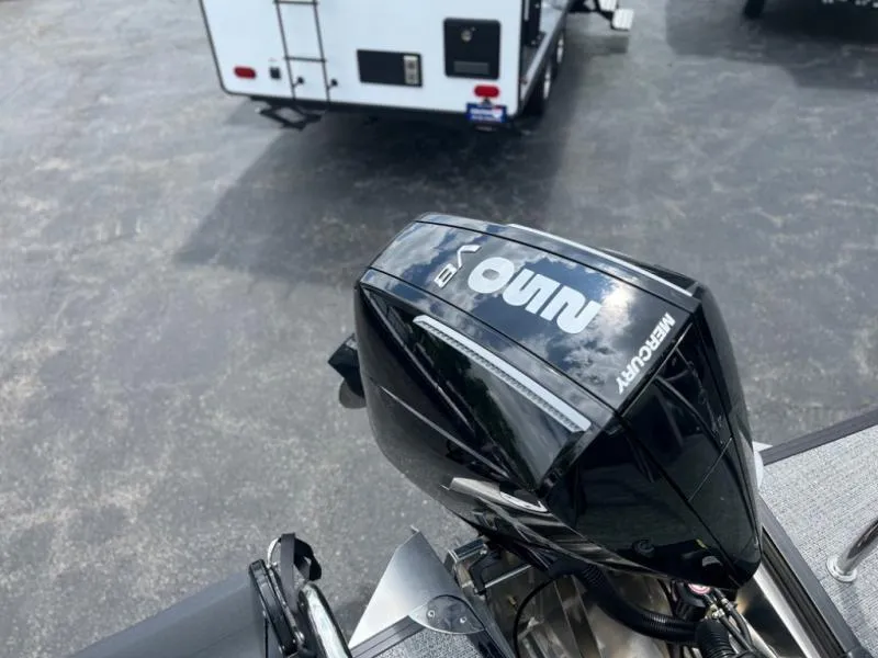 Slide: The Image of 2024 Barletta Cabrio Ultra Lounge C24UC with Mercury outboard motor. - 9