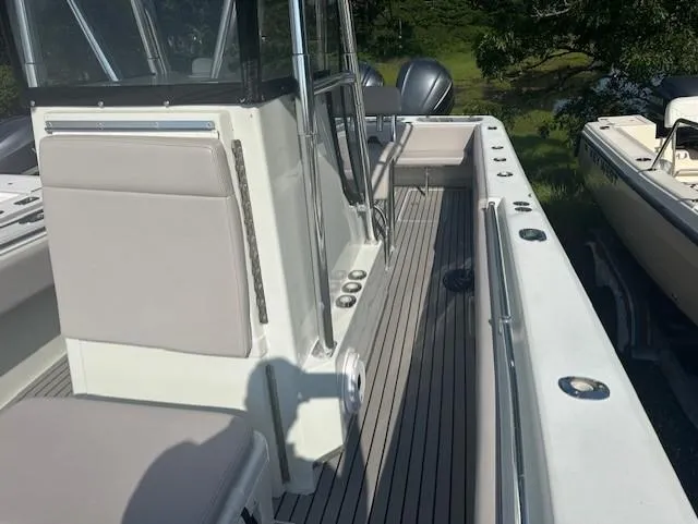 Slide: The Image of 2003 Contender 31 Open boat interior with seating and deck view. - 9