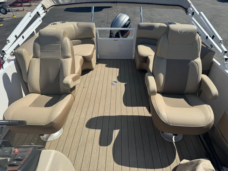 Slide: The Image of 2023 Veranda Relax VR20RC boat interior with beige seating and wood-style flooring. - 8