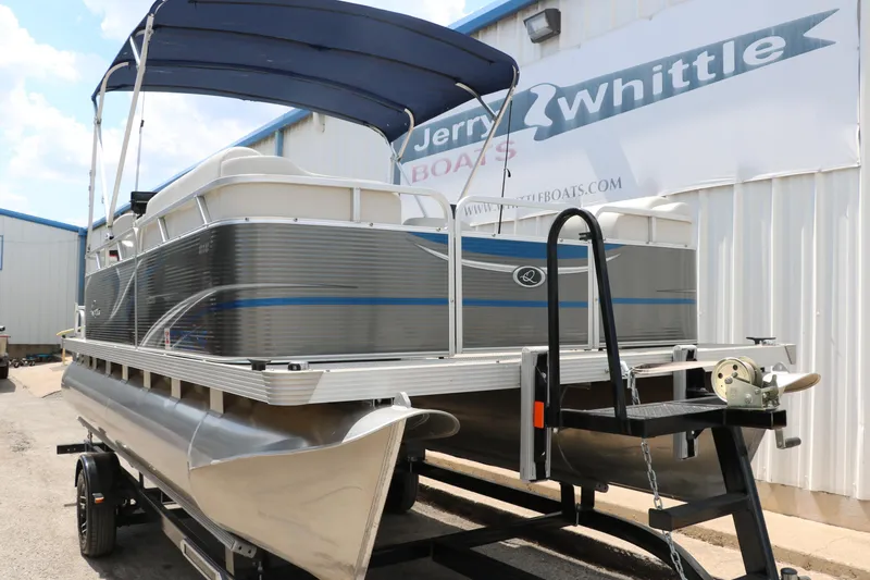 Slide: The Image of 2020 Qwest 818 EDGE pontoon boat on trailer at Jerry Whittle Boats dealership. - 13