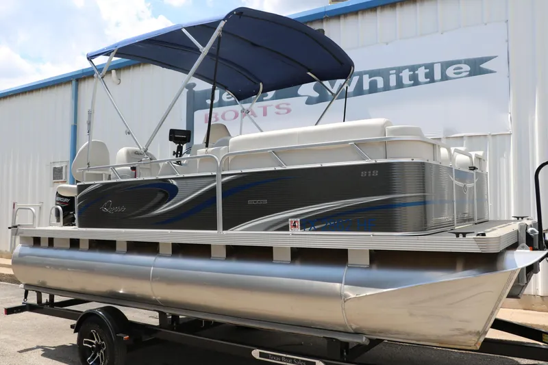 Slide: The Image of 2020 Qwest 818 EDGE pontoon boat with blue canopy on trailer. - 15