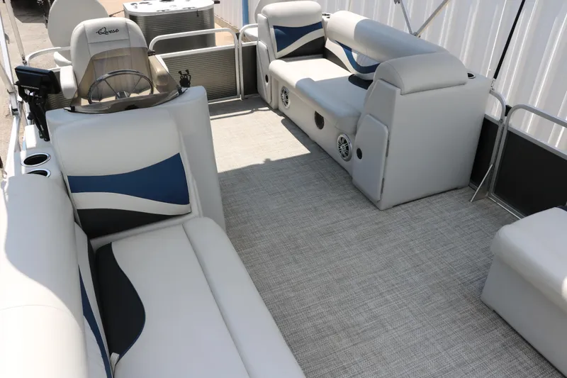 Slide: The Image of 2020 Qwest 818 EDGE pontoon boat interior with plush seating and modern design. - 21