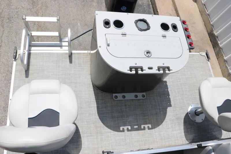 Slide: The Image of 2020 Qwest 818 EDGE boat interior with helm and seating. - 26