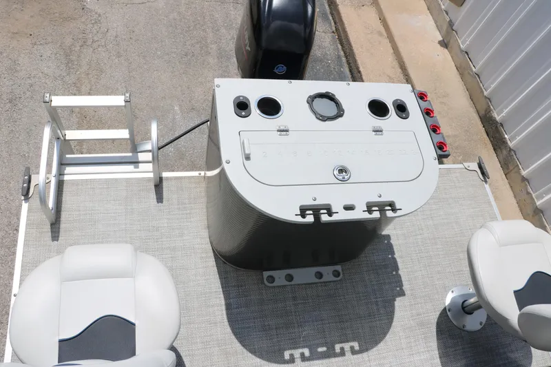 Slide: The Image of Top view of a 2020 Qwest 818 EDGE boat's control console and seating. - 27