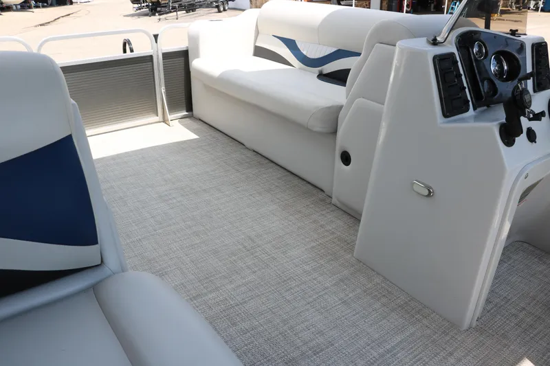 Slide: The Image of 2020 Qwest 818 EDGE boat interior with seating and control console. - 29
