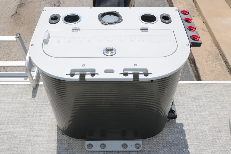 Slide: The Image of 2020 Qwest 818 EDGE boat console with control panel and cup holders. - 30