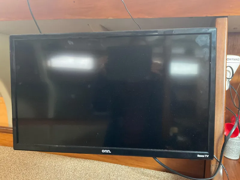 Slide: The Image of Onn Roku TV mounted inside a 1983 Jeanneau Attalia sailboat. - 18