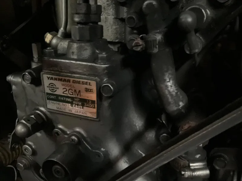 Slide: The Image of Yanmar Diesel 2GM engine in a 1983 Jeanneau Attalia sailboat. - 25