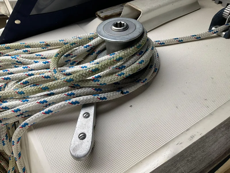 Slide: The Image of Winch and ropes on 1983 Jeanneau Attalia sailboat deck. - 31