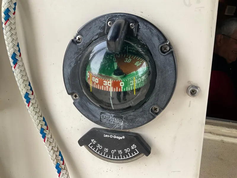 Slide: The Image of Compass and inclinometer on 1983 Jeanneau Attalia sailboat dashboard. - 35