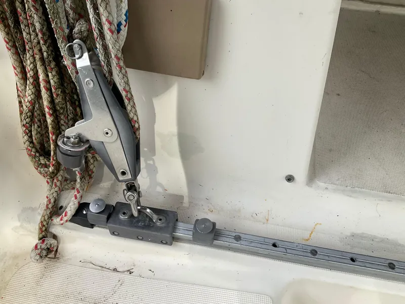 Slide: The Image of Close-up of Jeanneau Attalia 1983 sailboat rigging and pulley system. - 36