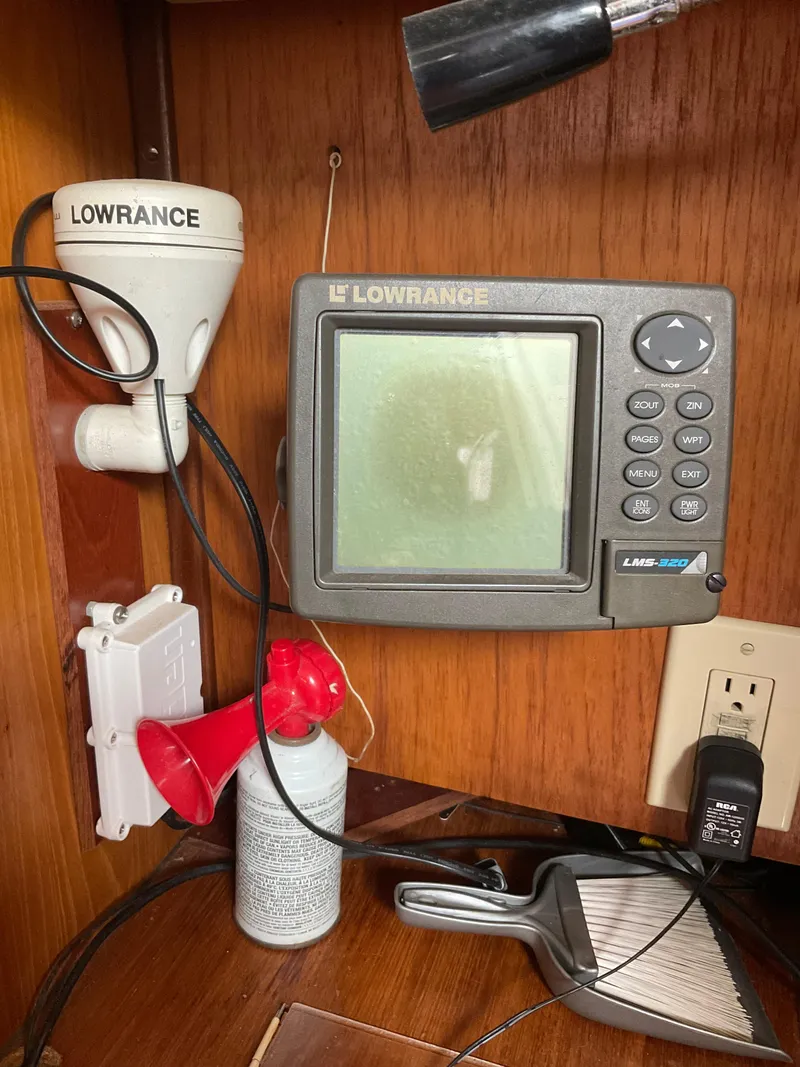 Slide: The Image of Lowrance marine electronics setup on 1983 Jeanneau Attalia sailboat. - 4
