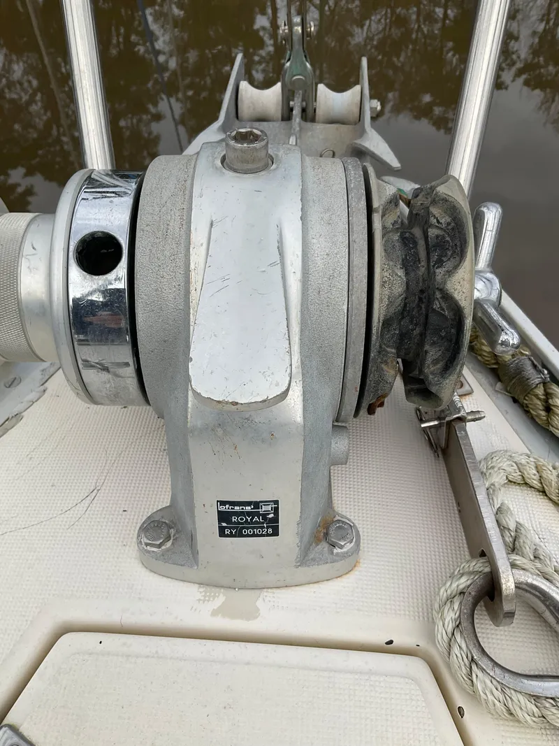 Slide: The Image of Anchor windlass on 1983 Jeanneau Attalia sailboat deck. - 46