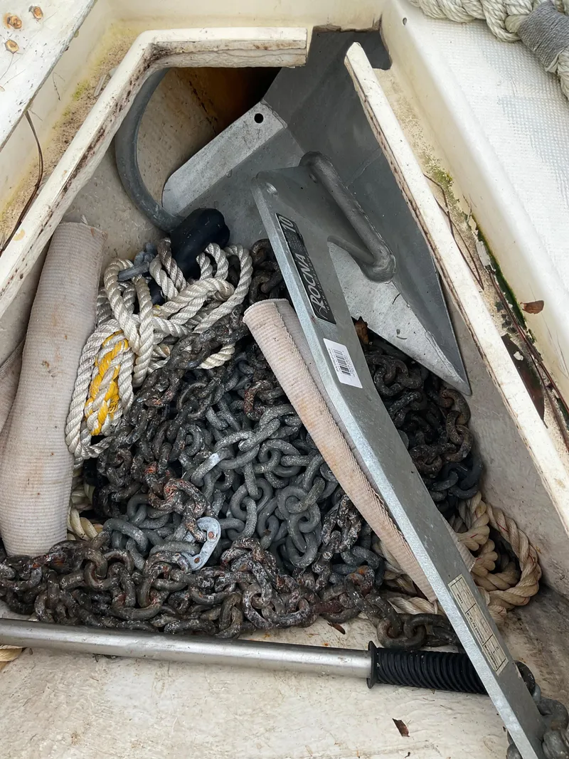 Slide: The Image of Anchor and chains in Jeanneau Attalia 1983 sailboat storage compartment. - 49