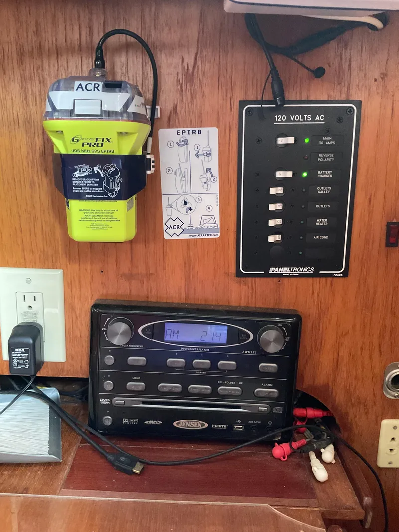 Slide: The Image of Control panel and radio equipment on a 1983 Jeanneau Attalia sailboat. - 5