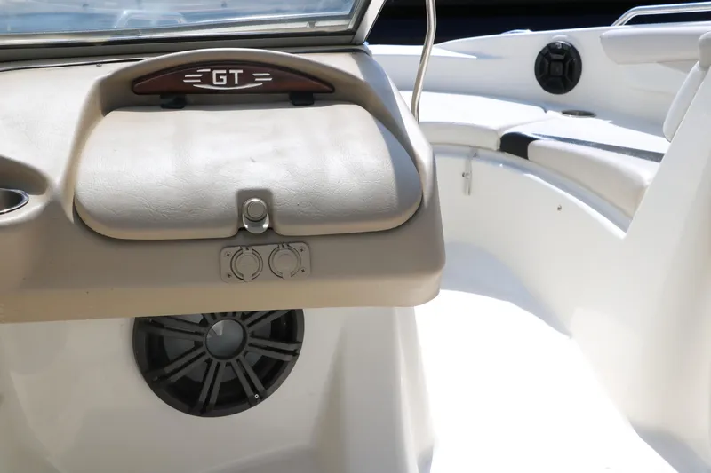 Slide: The Image of 2008 Glastron GT225 boat interior dashboard and seating area. - 31