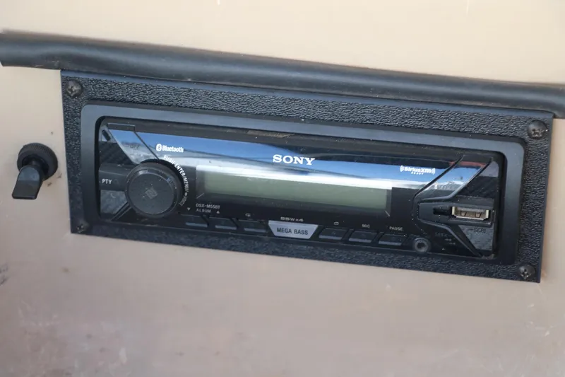 Slide: The Image of Sony Bluetooth stereo system in a 2008 Glastron GT225 boat. - 38