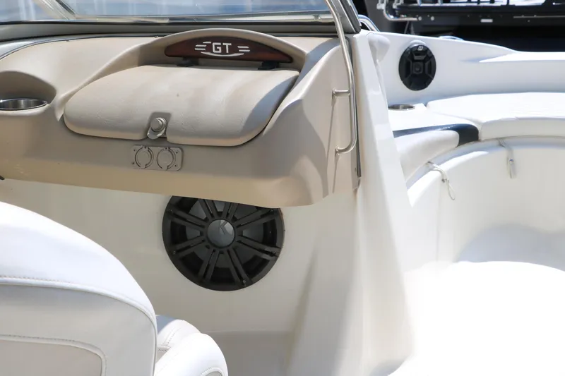 Slide: The Image of 2008 Glastron GT225 boat interior with speaker and dashboard. - 41